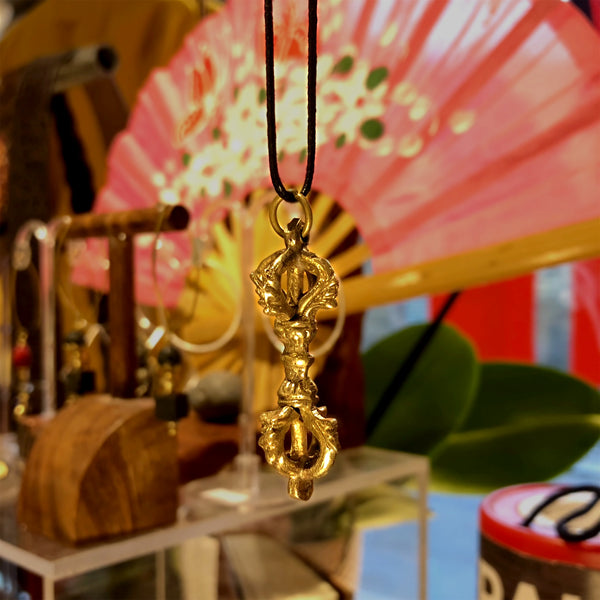 Fairtrade Nepalese Brass Buddhist Vajra / Dorje Pendant - shop display