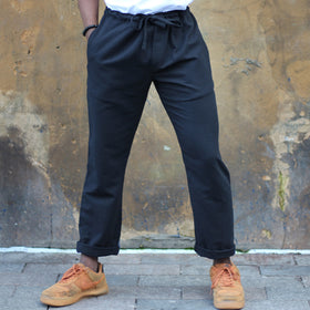 Unisex Ribbed Cotton Shing Mai Trousers Black front, on model