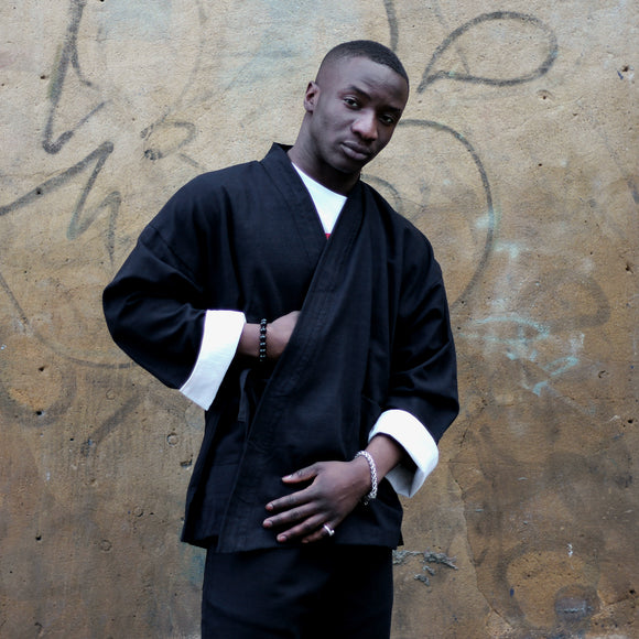 Unisex black ribbed cotton Samue Kimono Jacket - front